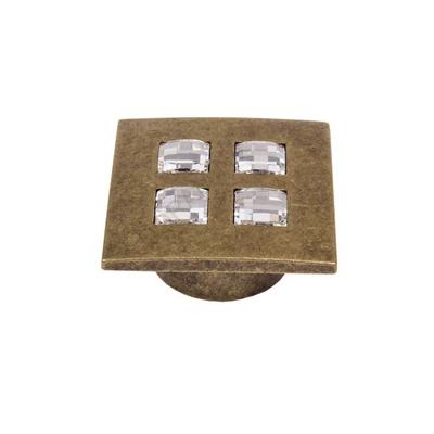 BÚTORFOGANTYÚ 655.000.KRD1 . ANTIKOLT BRONZ-SWAROVSKI KRISTÁLY